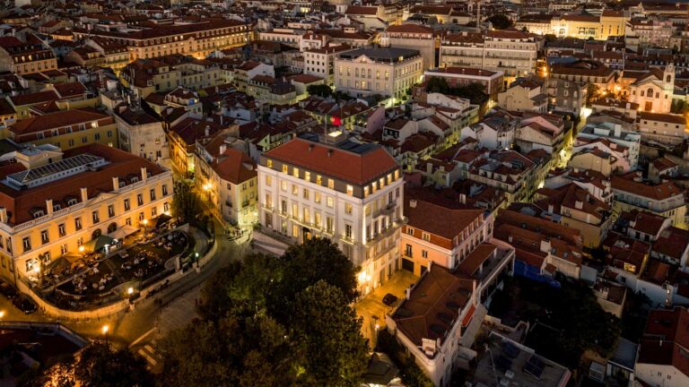 Stunning night aerial view of the historic Verride Santa Catarina luxury palace hotel in Lisbon