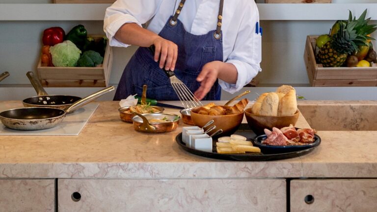 Chef preparing fresh gourmet ingredients at Verride Santa Catarina luxury hotel